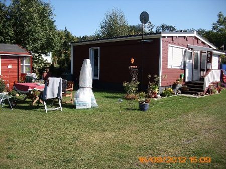 Mobilheim mit Garten und Sitzecke